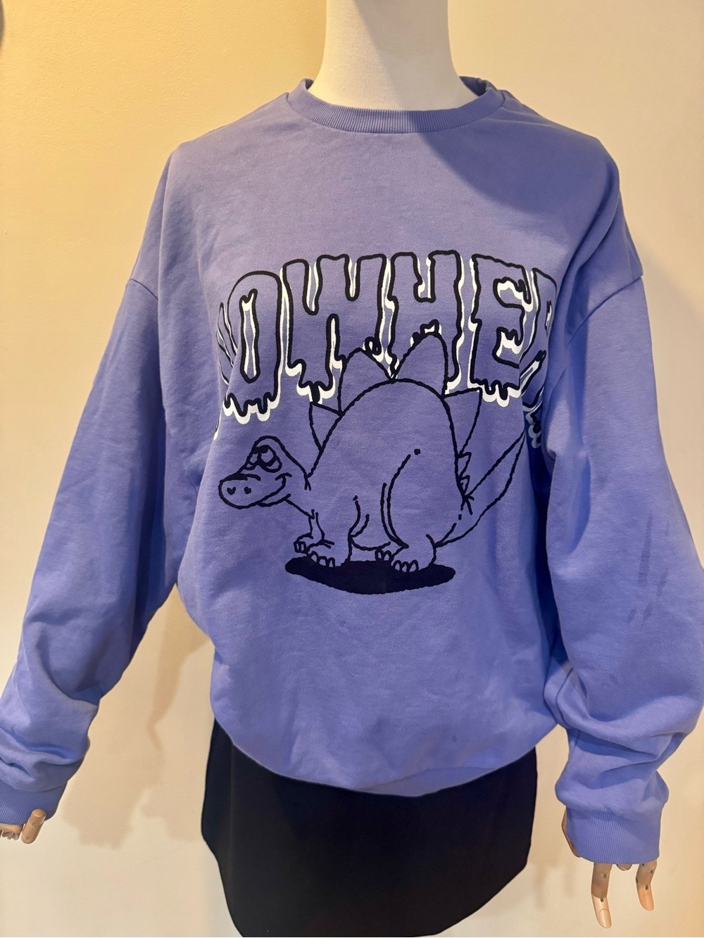 ASOS Design men’s Lavender Graphic Crewneck Sweater with Dinosaur Motif